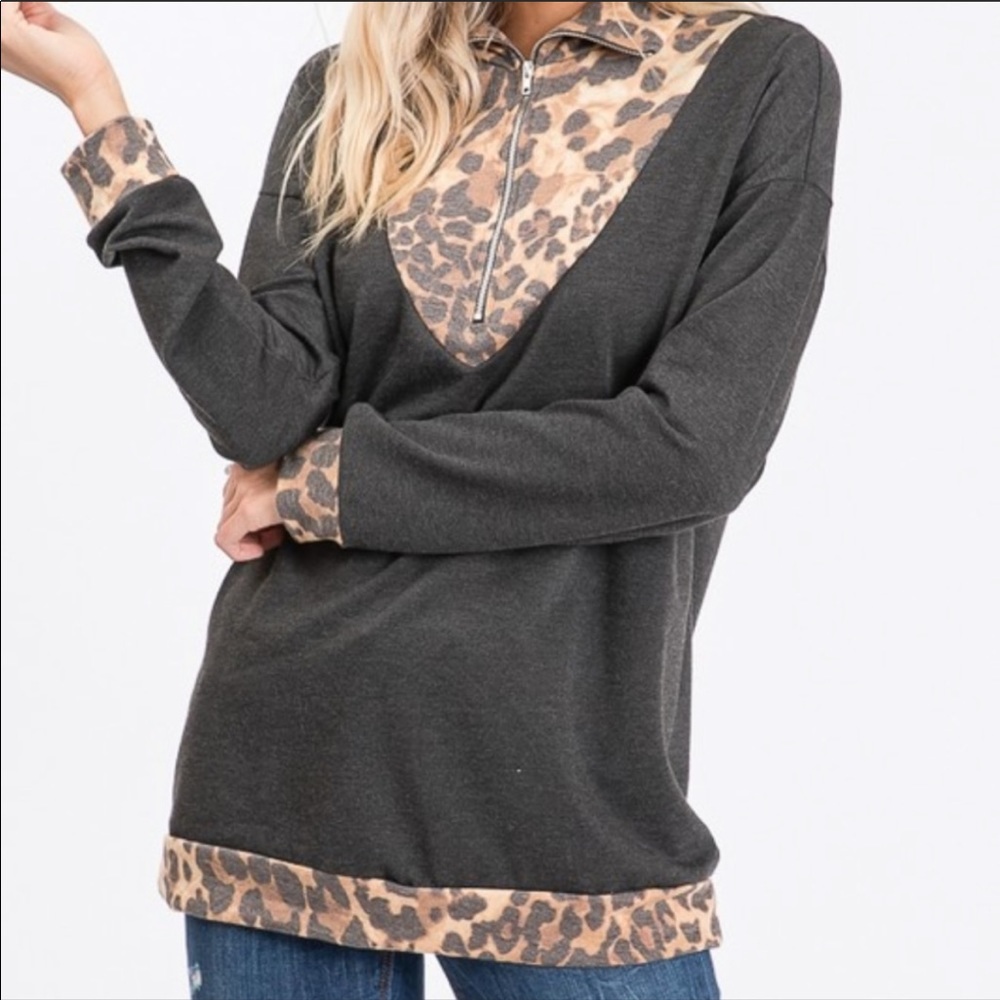 Women’s size small leopard trim blouse
